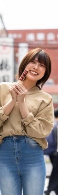 front-view-smiley-woman-holding-food_23-2149453060